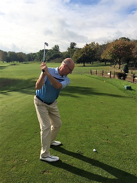 top of the backswing