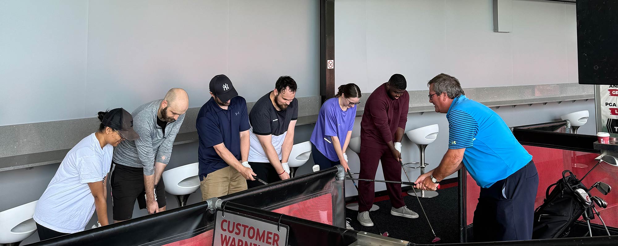 Golf coaching in groups